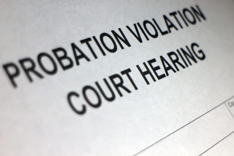 Up close photo of the text "PROBATION VIOLATION COURT HEARING."