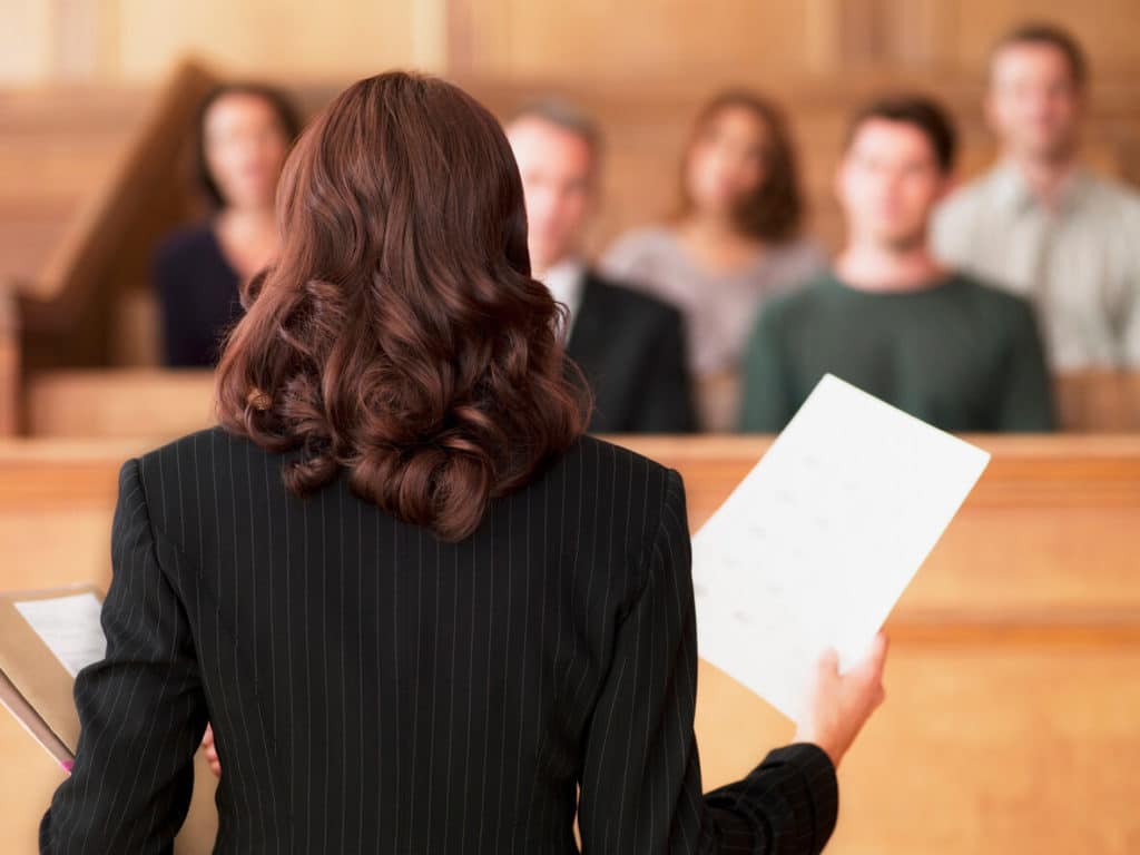 court-trial-lawyer Lawyer presenting evidence in criminal case trial