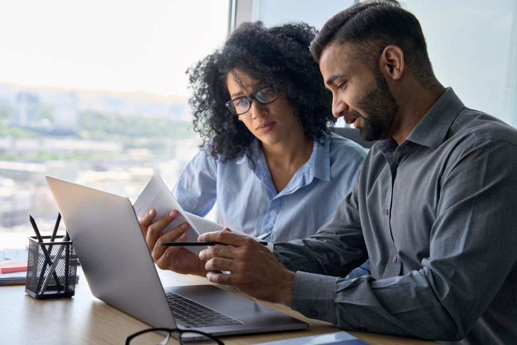 Two people working