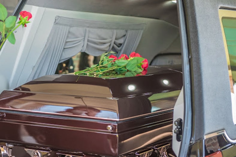 casket leaving a funeral